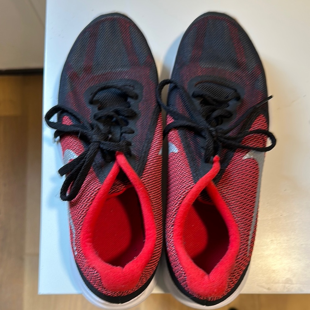 Red and Black Athletic Shoes Nike - Worn once.  Excellent condition